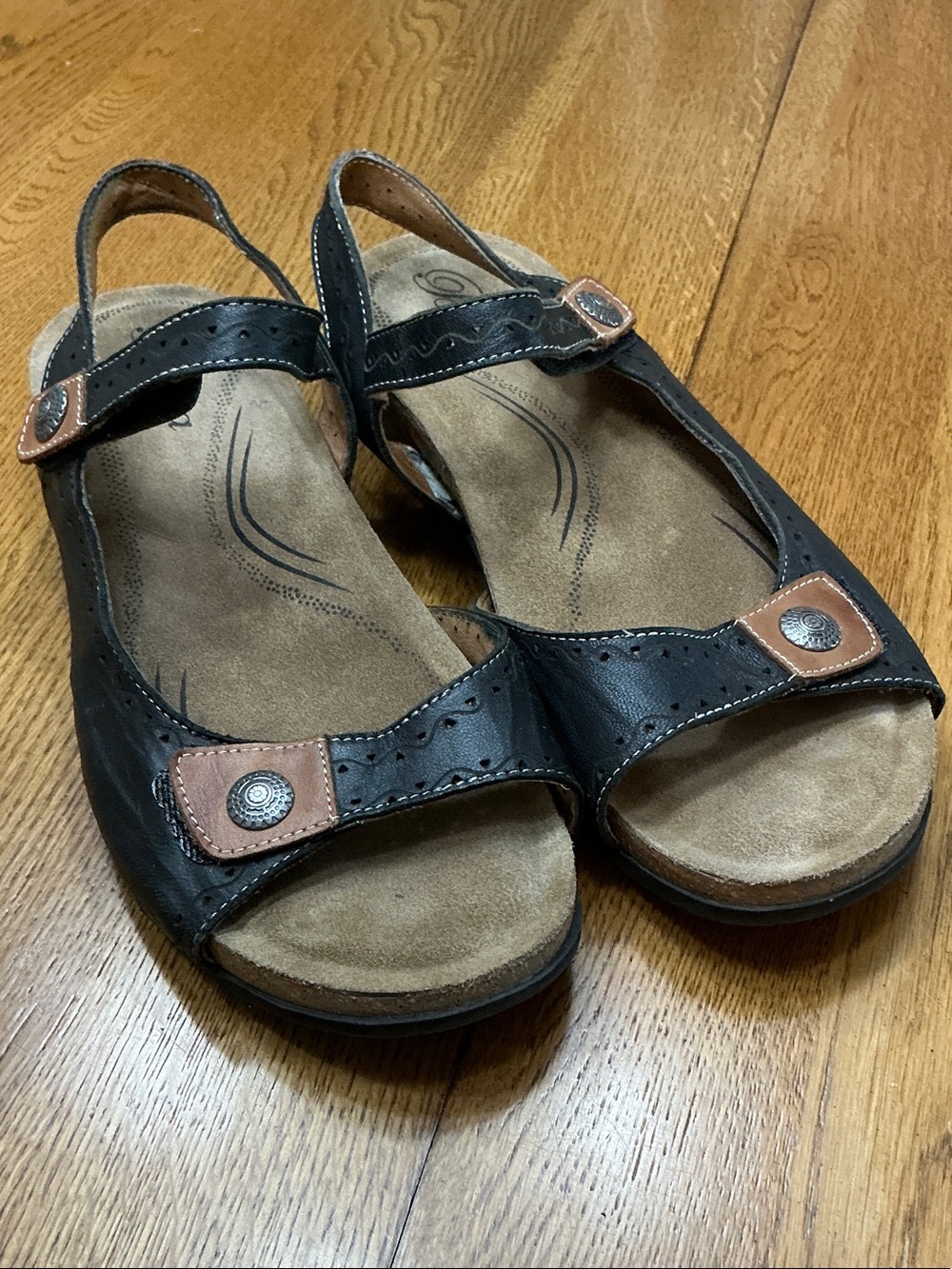 Woman’s Biza black sandal. Size 41. Hook and look both straps. Suede inner sole